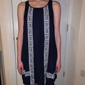 A navy and white mini dress, crown and ivy